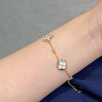 ¡®Imperial¡¯STAR AND SUN 4 MOTIF WHITE MOP PINK GOLD BRACELET