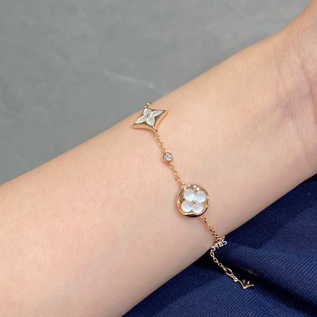 ¡®Imperial¡¯STAR AND SUN 4 MOTIF WHITE MOP PINK GOLD BRACELET