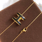 ¡®Imperial¡¯HM CLIC BLACK ENAMEL GOLD NECKLACE